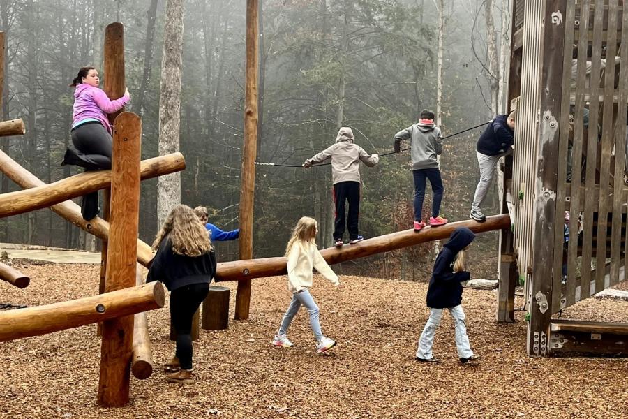 Children playing on the Fox Den playground at Kingsport's Bays Mountain Park