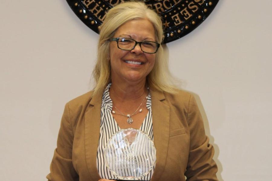 Ottinger with award